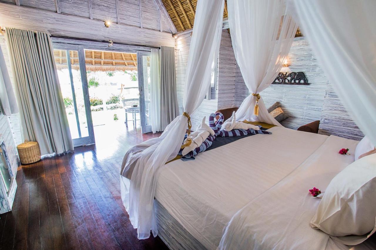 Bay Shore Huts نوسا ليمبونغان المظهر الخارجي الصورة